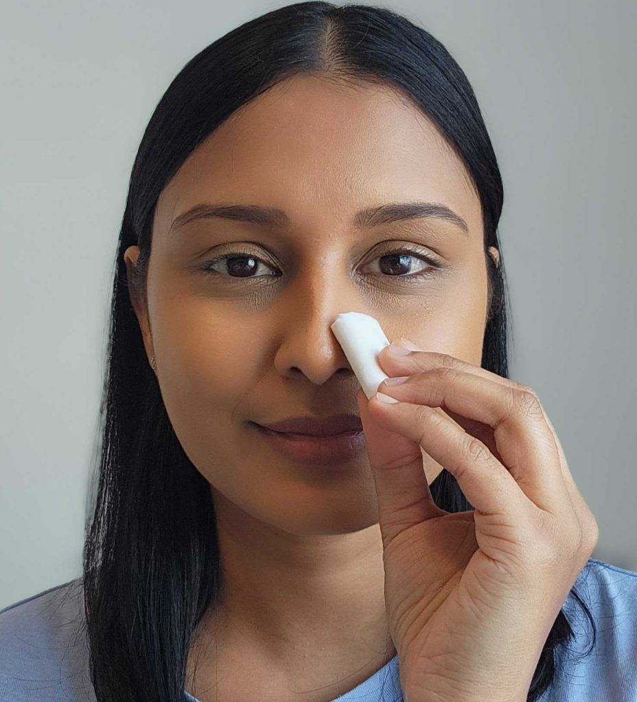 woman step-by-step applying nose strip adhesive