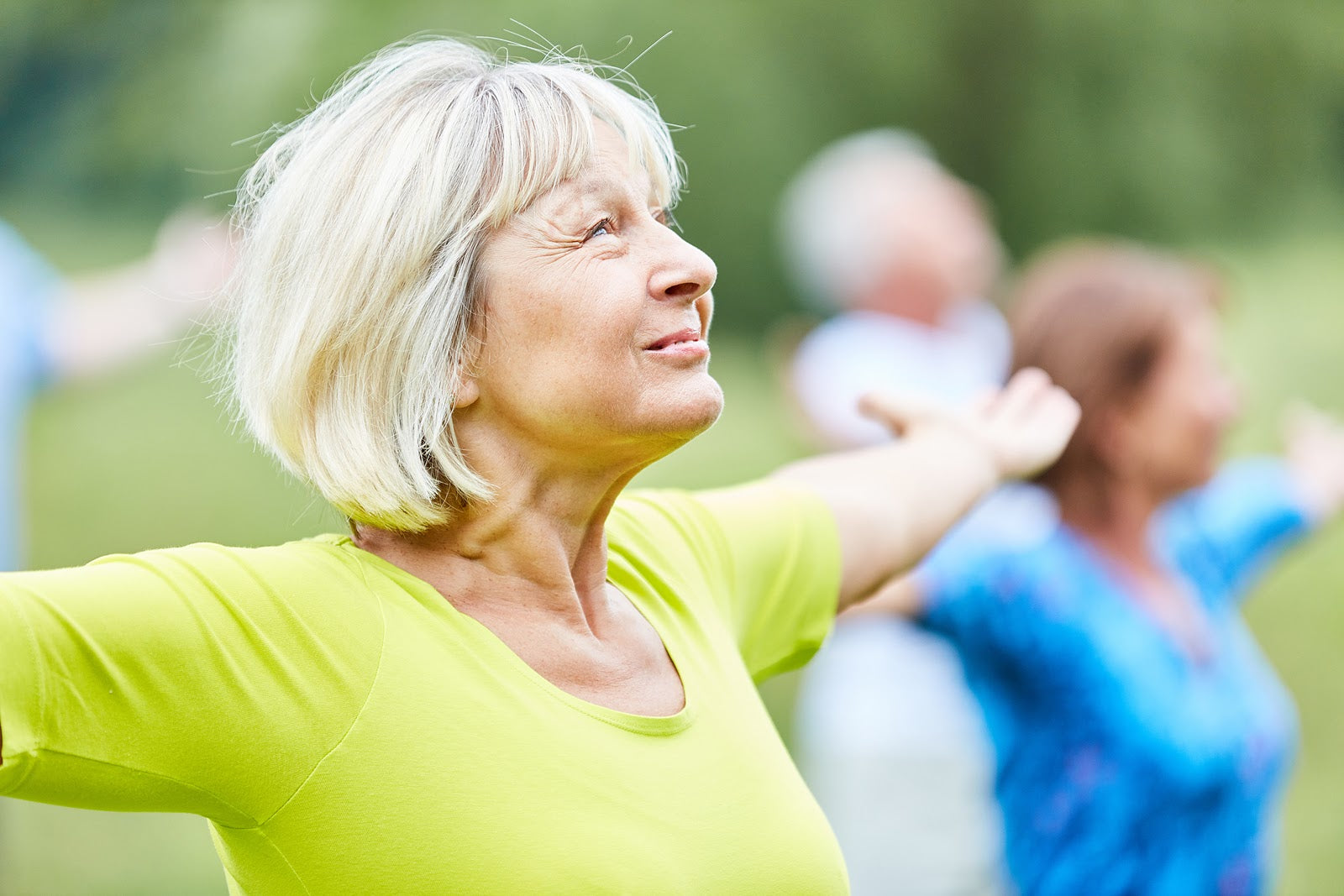 woman smiling and exercising 