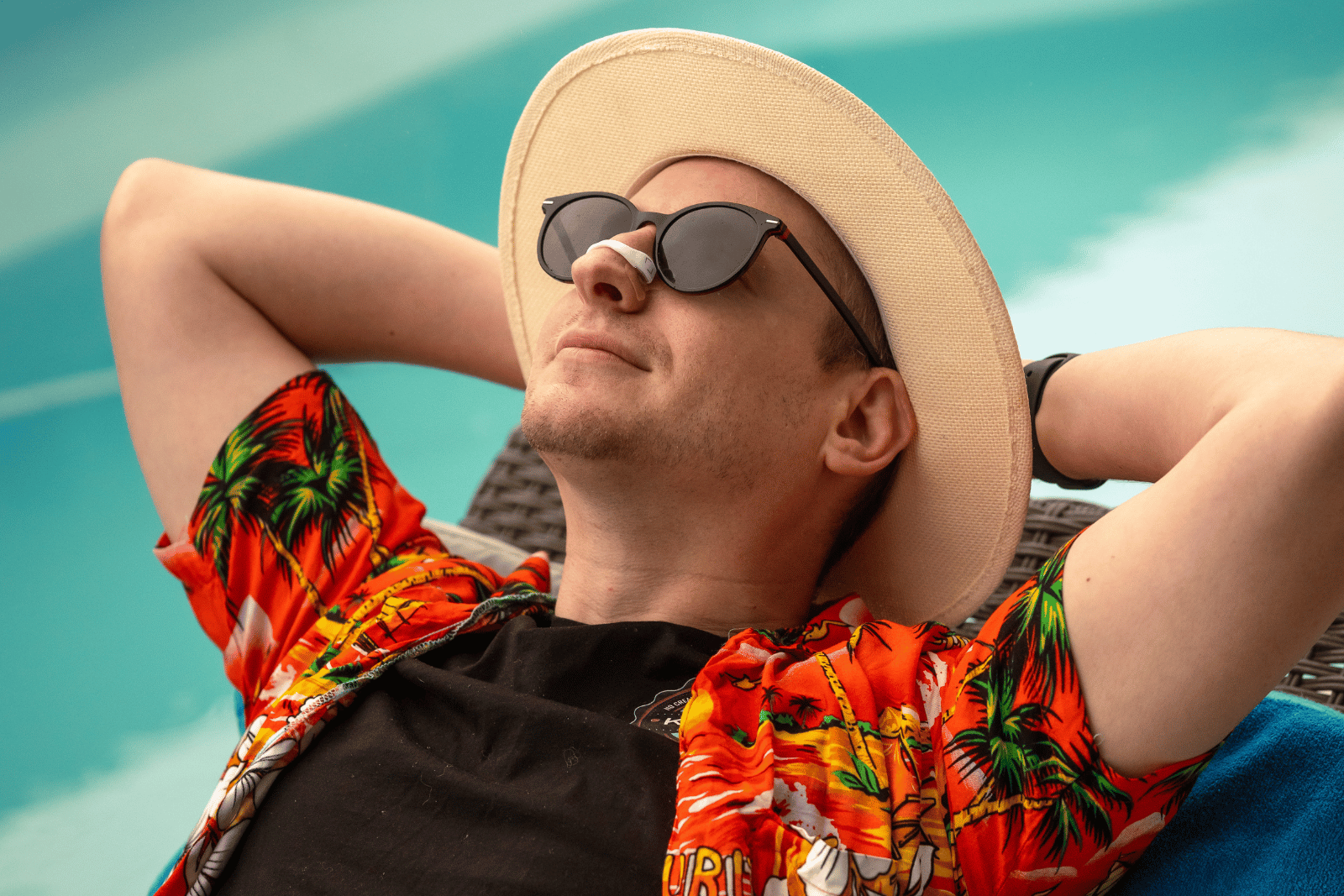 man wearing magnetic nose strips for breathing and relaxing 